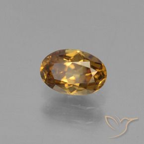 Granada de mudança de cor dourado natural 0,72ct, corte oval, VVS-VS