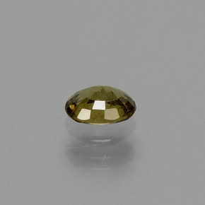 Granada de mudança de cor amarelo natural 0,62ct, corte oval, VS