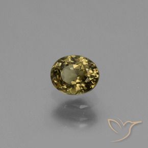 Granada de mudança de cor amarelo natural 0,65ct, corte oval, VS