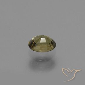 Granada de mudança de cor amarelo natural 0,65ct, corte oval, VS