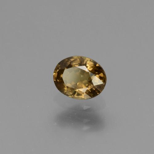 Granada de mudança de cor amarelo natural 0,65ct, corte oval, VS