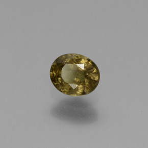 Granada de mudança de cor amarelo natural 0,66ct, corte oval, VS