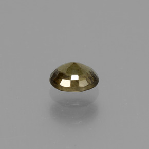 Granada de mudança de cor amarelo natural 0,66ct, corte oval, VS