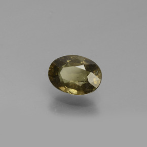 Granada de mudança de cor amarelo natural 0,69ct, corte oval, VS