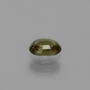 Granada de mudança de cor amarelo natural 0,69ct, corte oval, VS
