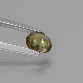 Granada de mudança de cor marrom natural 0,55ct, corte oval, VS