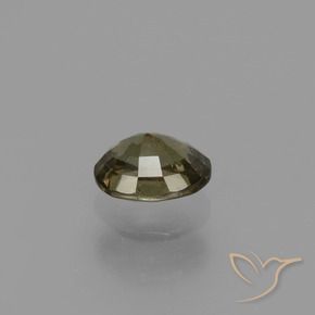 Granada de mudança de cor marrom natural 0,87ct, corte oval, VS