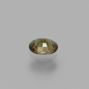 Granada de mudança de cor marrom natural 0,77ct, corte oval, VS