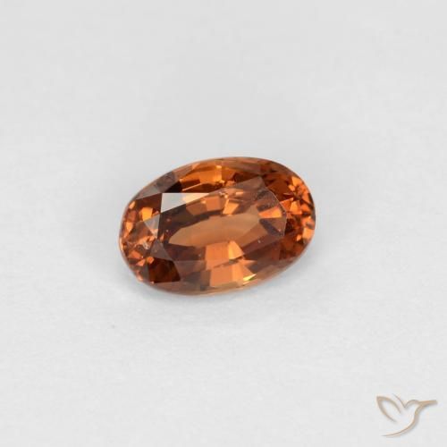 Granada de mudança de cor marrom natural 0,60ct, corte oval, VS