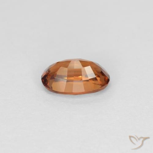 Granada de mudança de cor marrom natural 0,60ct, corte oval, VS