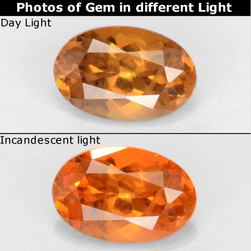 Granada de mudança de cor marrom natural 0,61ct, corte oval, VS