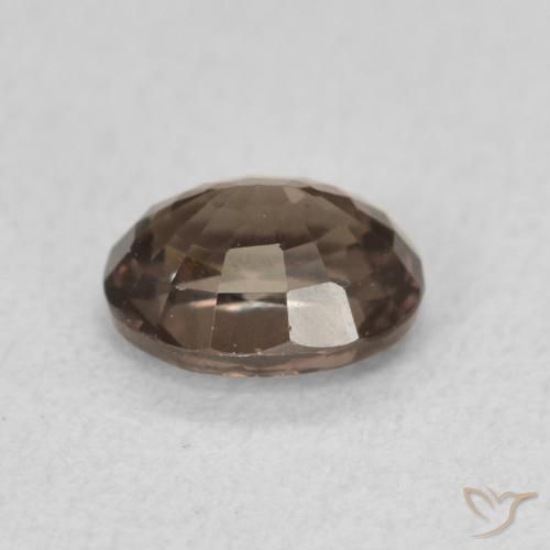 Granada que muda de cor Marrom escuro Natural 0.97ct, oval, VS