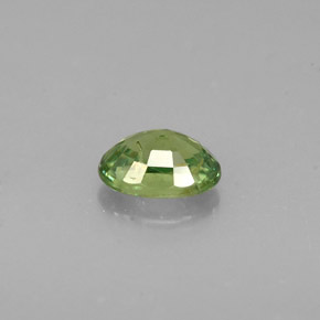 Granada demantoide verde natural 0,48ct, corte oval, VS-SI