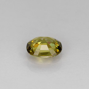 Granada demantoide verde natural 0,62ct, corte oval, VS