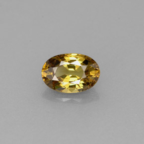 Granada demantoide amarelo natural 0,63ct, corte oval, VS