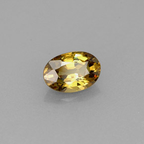 Granada demantoide amarelo natural 0,63ct, corte oval, VS