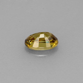 Granada demantoide amarelo natural 0,63ct, corte oval, VS