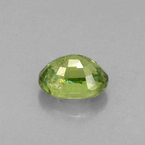 Granada demantoide verde natural 0,79ct, corte oval, VS-SI