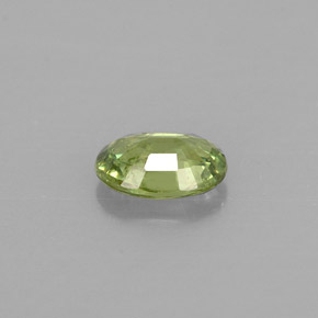 Granada demantoide verde natural 0,54ct, corte oval, VS-SI