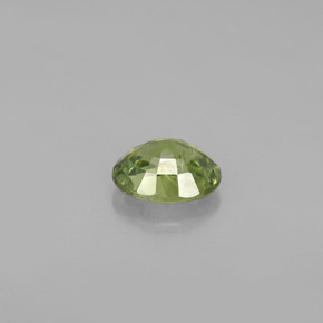 Granada demantoide verde natural 0,66ct, corte oval, VS-SI