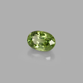 Granada demantoide verde natural 0,72ct, corte oval, VS
