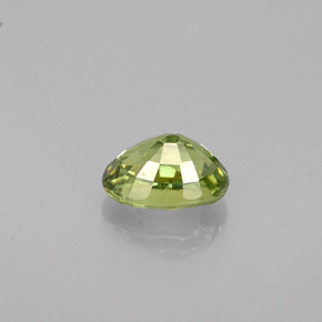 Granada demantoide verde natural 0,64ct, corte oval, VS