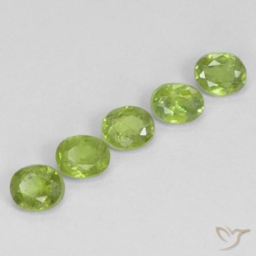 Pedras preciosas de Granada demantóide verde vivo natural de 1.33 ct, oval, VS-SI