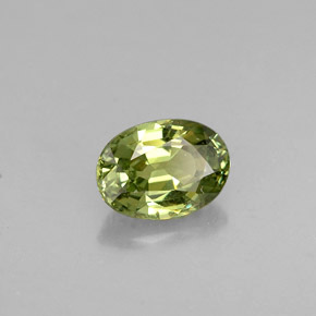 Granada demantoide verde natural 0,62ct, corte oval, VS