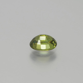 Granada demantoide verde natural 0,71ct, corte oval, VVS-VS