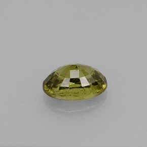 Granada demantoide amarelo natural 0,65ct, corte oval, VS-SI