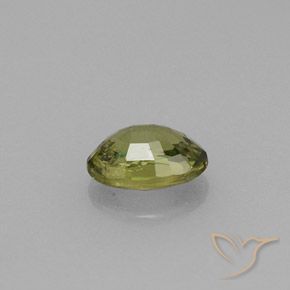 Granada demantoide verde natural 0,61ct, corte oval, VVS-VS