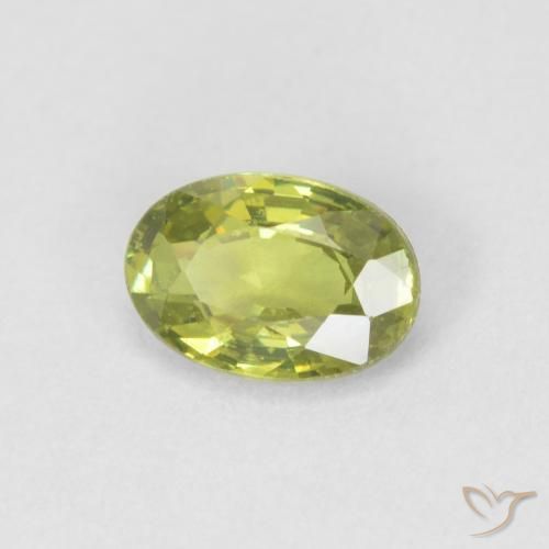 Granada demantóide Verde Terroso Quente Natural 0.55ct, oval, VVS-VS