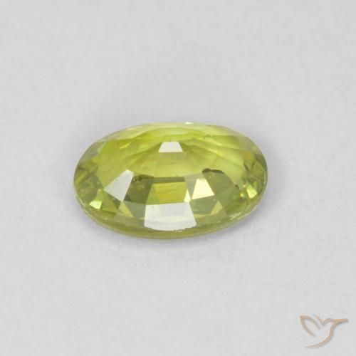 Granada demantóide Verde Terroso Quente Natural 0.55ct, oval, VVS-VS