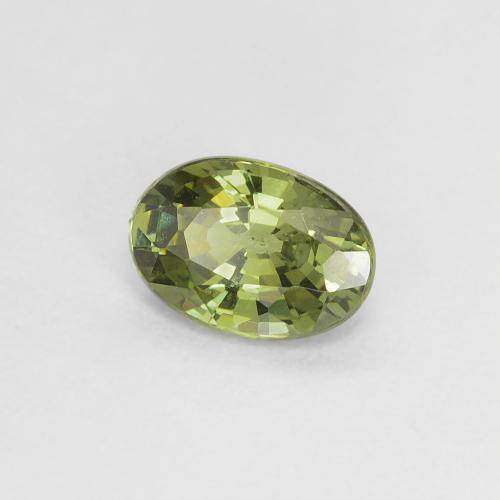 Granada demantoide amarelo natural 0,58ct, corte oval, VS
