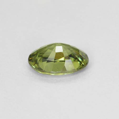 Granada demantoide amarelo natural 0,58ct, corte oval, VS