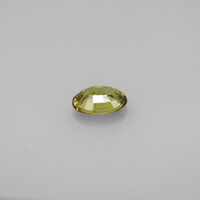 Granada demantoide verde natural 0,63ct, corte oval, VS