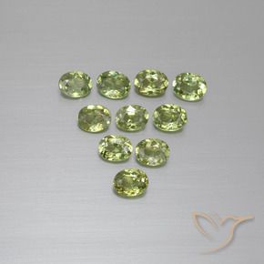 Pedras preciosas de Granada demantóide verde quente natural de 2.05 ct, oval, VS
