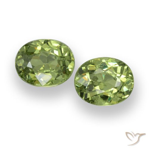 Pedras preciosas de granada demantoide verde natural de 0,88 ct, corte oval, VS