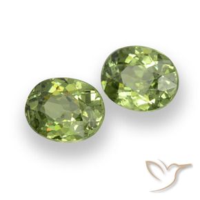 Pedras preciosas de granada demantoide verde natural de 0,88 ct, corte oval, VS