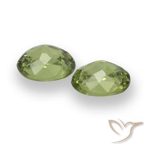 Pedras preciosas de granada demantoide verde natural de 0,88 ct, corte oval, VS