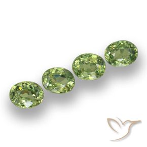 Pedras preciosas de Granada demantóide verde quente natural de 1.31 ct, oval, VS