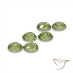 Pedras preciosas de Granada demantóide Verde amarelado natural de 1.98 ct, oval, VS