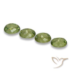 Pedras preciosas de Granada demantóide Luz verde natural de 1.25 ct, oval, VS