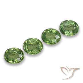 Pedras preciosas de Granada demantóide verde quente natural de 1.66 ct, oval, VS