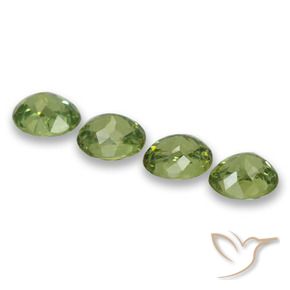 Pedras preciosas de Granada demantóide verde quente natural de 1.86 ct, oval, VS
