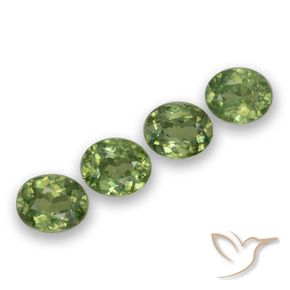 Pedras preciosas de Granada demantóide verde quente natural de 1.65 ct, oval, VS