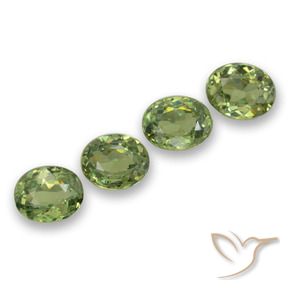 Pedras preciosas de Granada demantóide verde quente natural de 1.49 ct, oval, VS