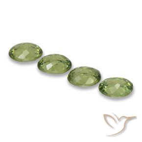Pedras preciosas de Granada demantóide verde quente natural de 1.49 ct, oval, VS