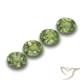 Pedras preciosas de Granada demantóide verde quente natural de 1.18 ct, oval, VVS-VS