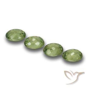 Pedras preciosas de Granada demantóide verde quente natural de 1.18 ct, oval, VVS-VS